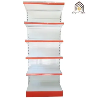 شلف فلزی کناردیوار فروشگاهی سامان انبار شرق طوس با طراحی مشبک و کاربردی برای نمایش محصولات.